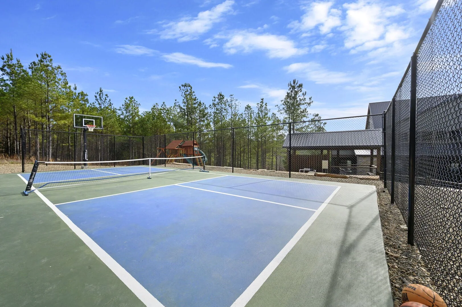 The private pickleball and basketball court